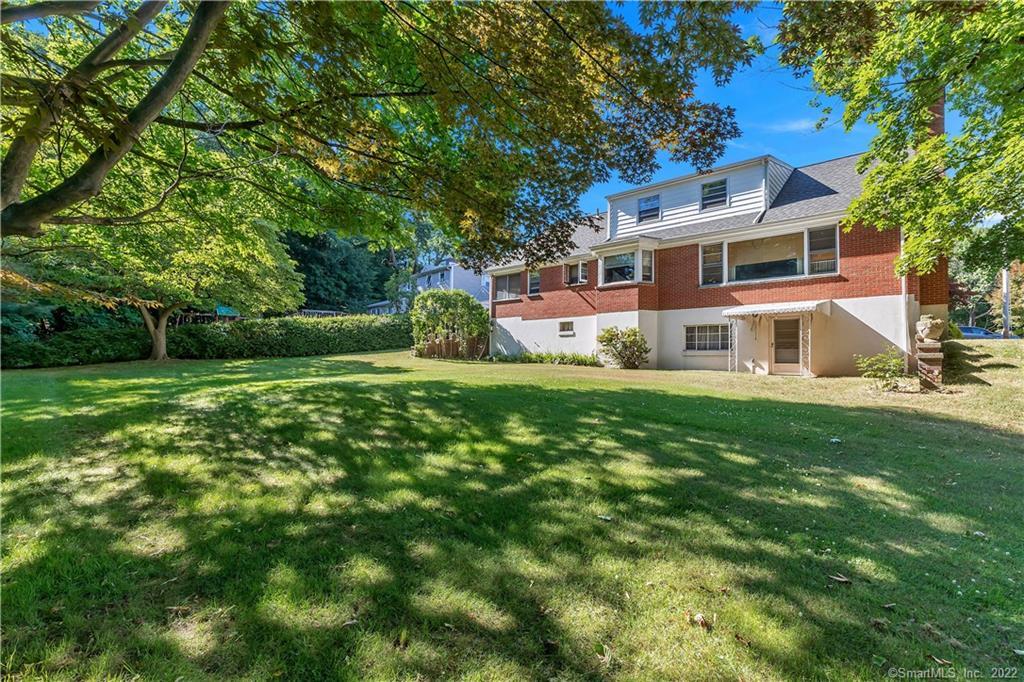 32 Koger Road Trumbull, CT 06611 - Photo 1 of 1 a front view of a house with garden