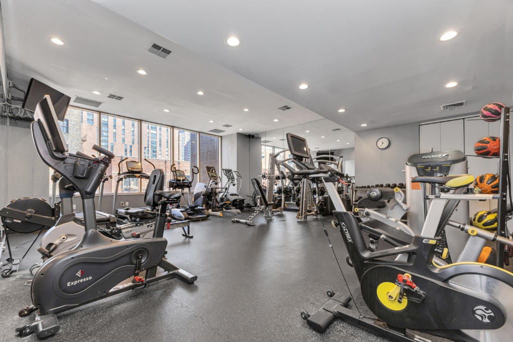 200 East 89th Street, Unit 37D Manhattan, NY 10128 - Photo 26 of 35 a view of a room with gym equipment