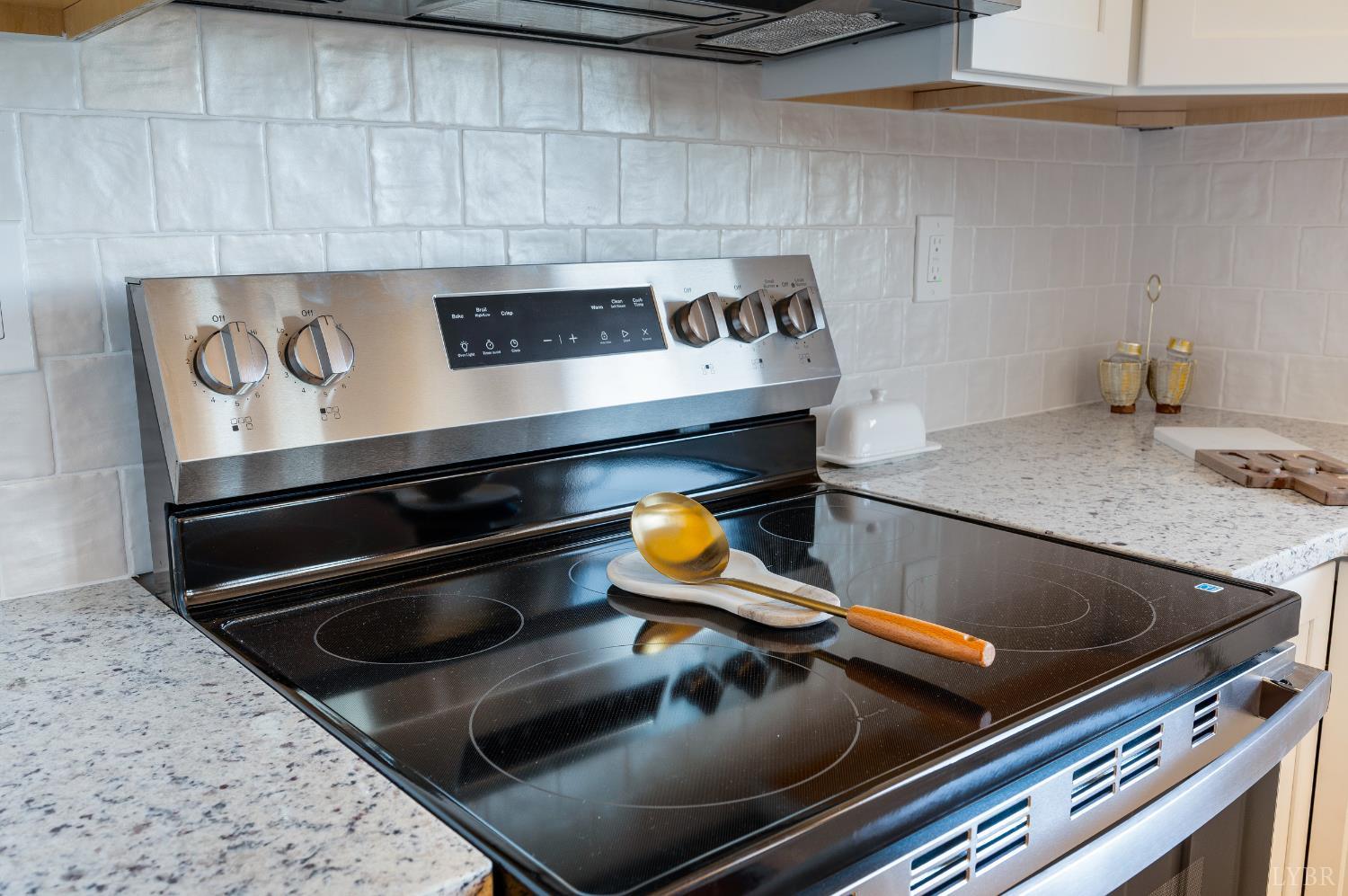 10528 Leesville Road Lynch Station, VA 24571 - Photo 12 of 58 a stove top oven sitting inside of a kitchen