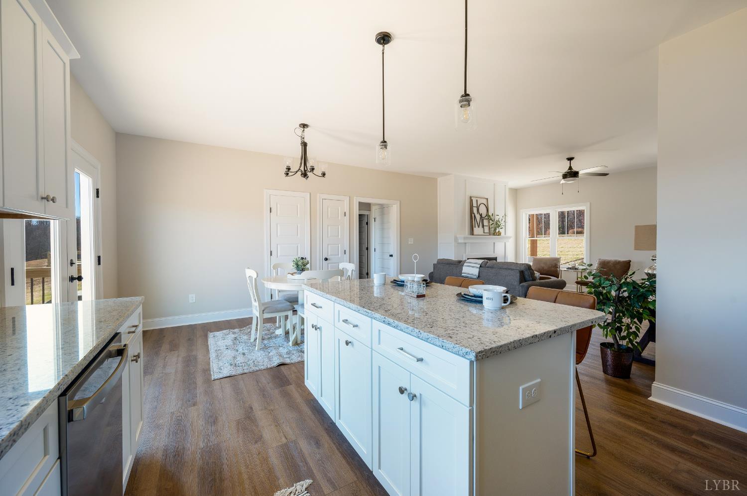 10528 Leesville Road Lynch Station, VA 24571 - Photo 15 of 58 a kitchen with sink stove and wooden floor