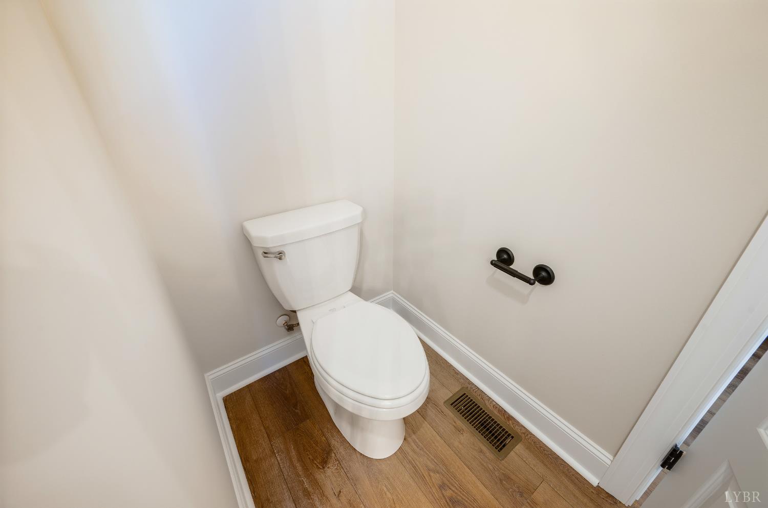 10528 Leesville Road Lynch Station, VA 24571 - Photo 24 of 58 a white toilet sitting in a bathroom