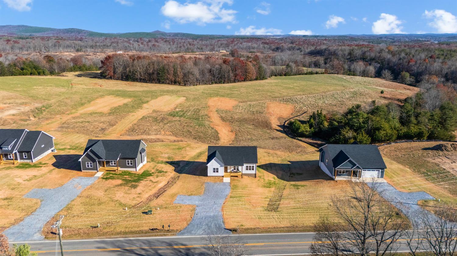 10528 Leesville Road Lynch Station, VA 24571 - Photo 50 of 58 an aerial view of residential houses with outdoor space