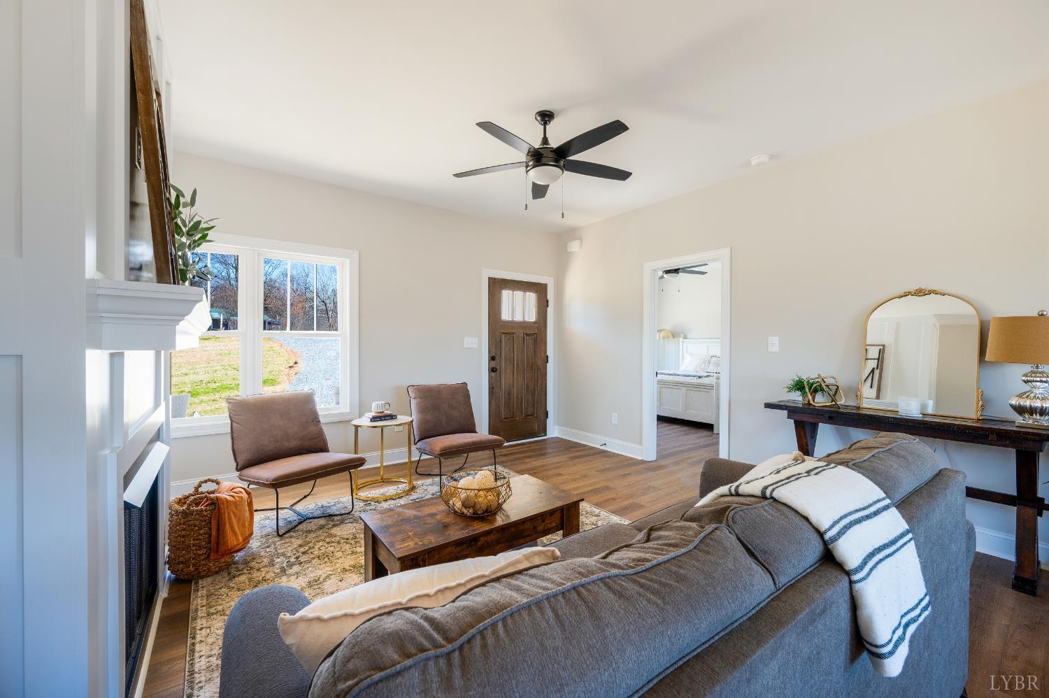 10528 Leesville Road Lynch Station, VA 24571 - Photo 6 of 58 a bedroom with a bed and couch