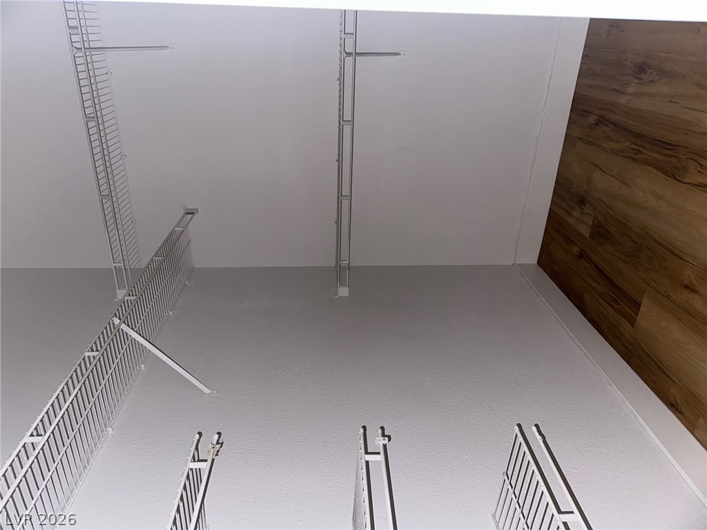 2050 West Warm Springs Road, Unit 1323 Henderson, NV 89014 - Photo 10 of 10 Streamlined closet system offers versatile storage for an organized wardrobe.