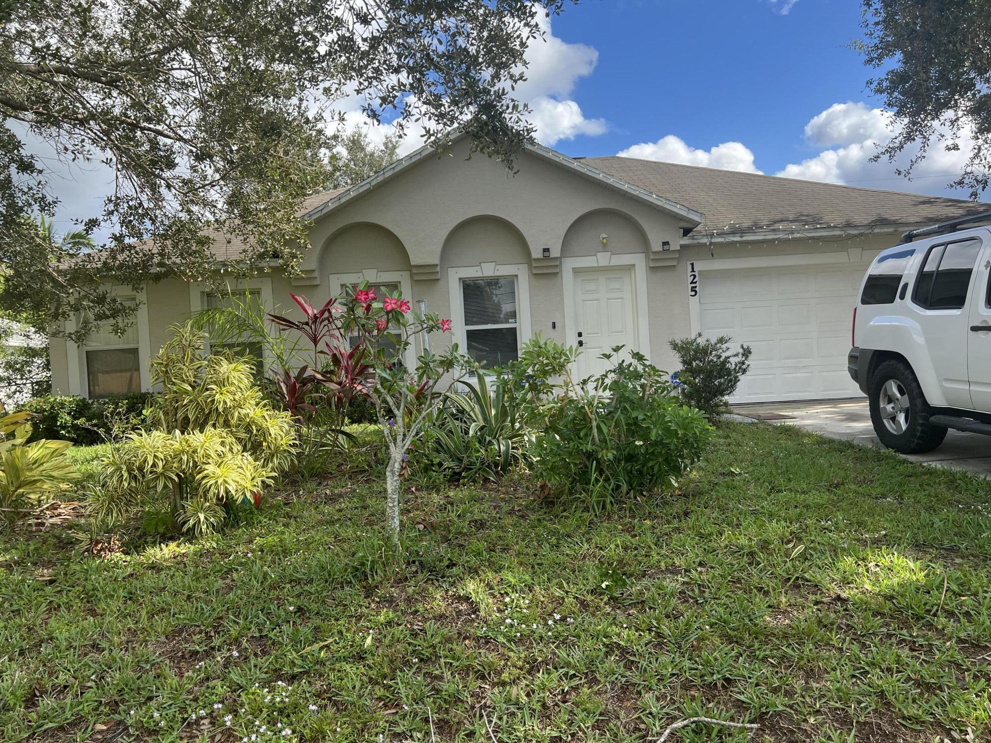 125 Southwest Covington Road Port St. Lucie, FL 34953 - Photo 2 of 16 E85FFFCF-DCAB-423A-8D4F-438DD69D16AB
