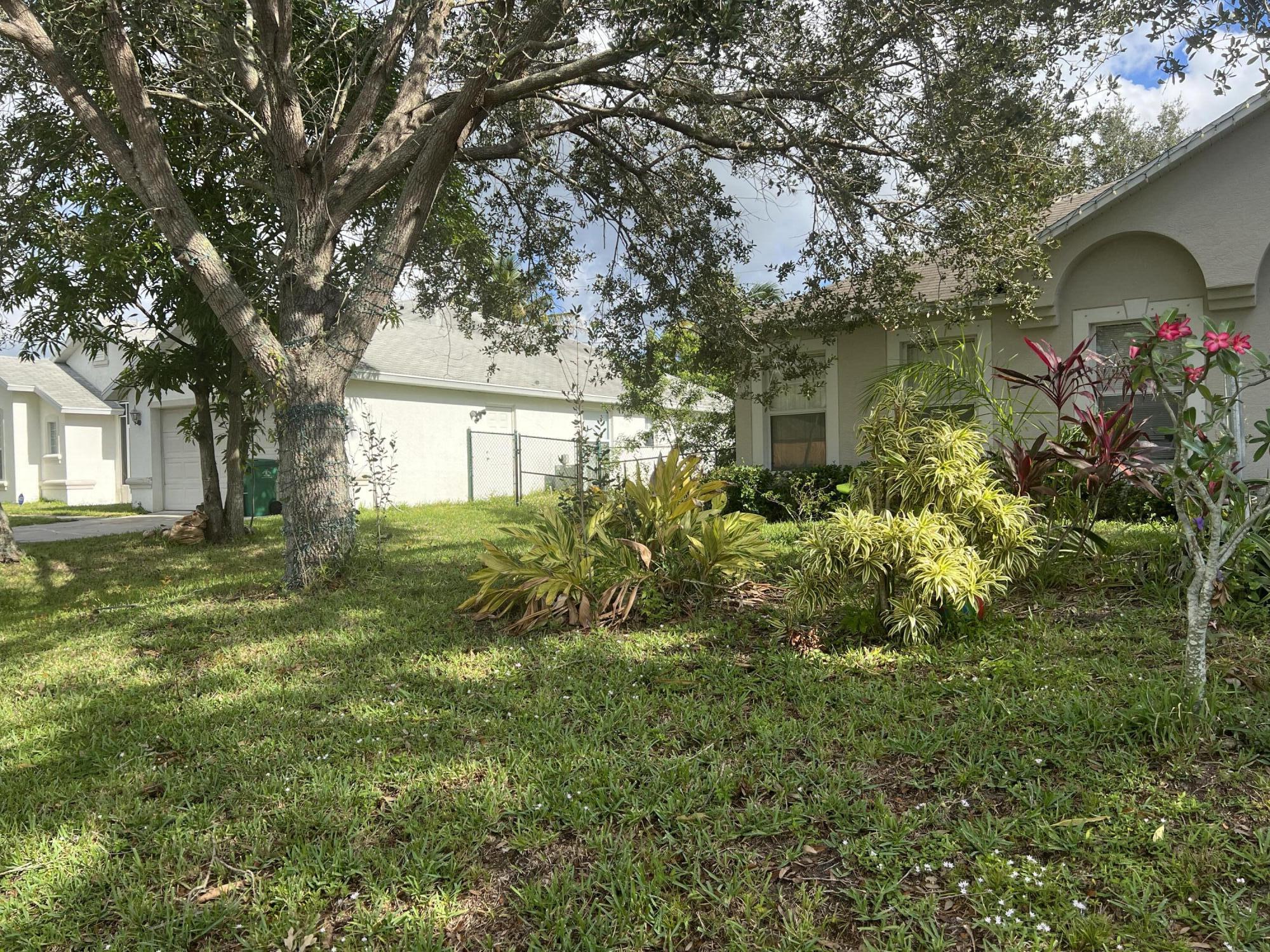 125 Southwest Covington Road Port St. Lucie, FL 34953 - Photo 3 of 16 B0FCF26C-BBEF-4B03-A618-C0F44B48FC4C