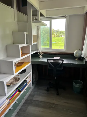 a room with furniture and window