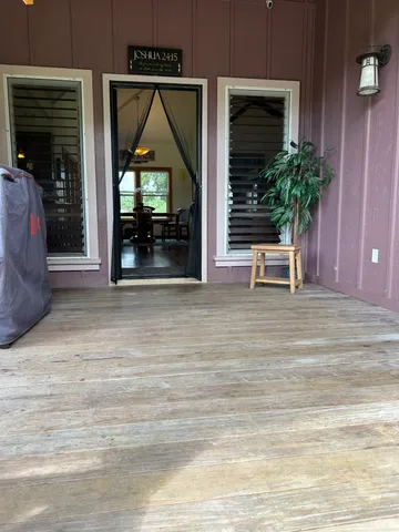 a view of front door and porch