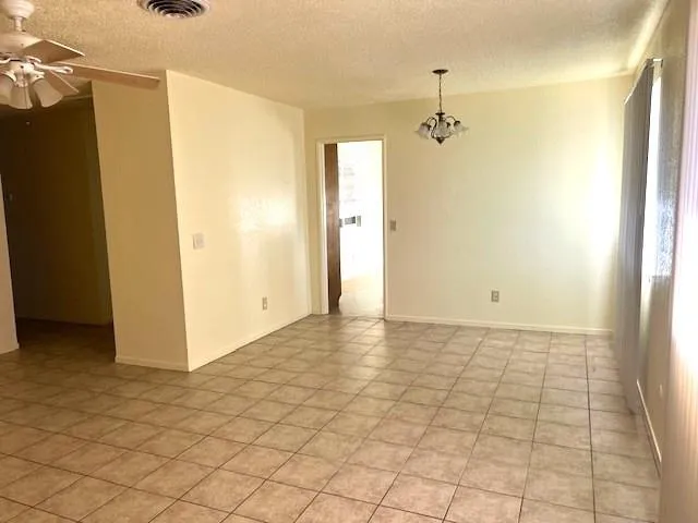 a view of a hallway with a shower