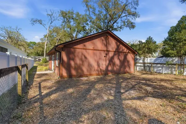 a view of backyard of house