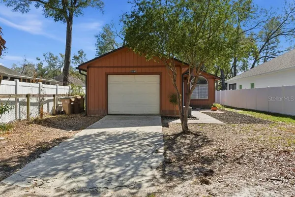 a house with trees in front of it