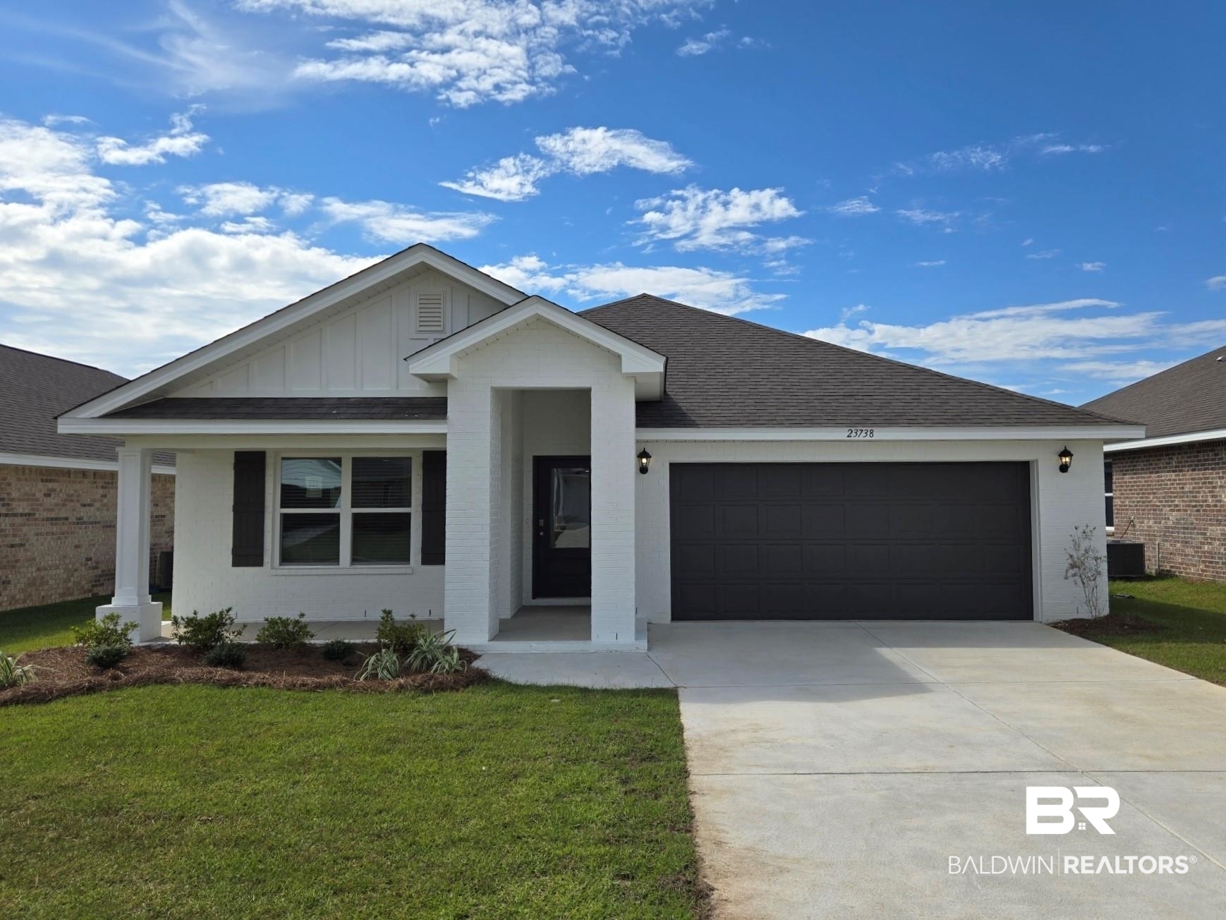 23738 Avernus Loop Daphne, AL 36526 - Photo 1 of 13 Single story home with a garage, covered porch, and a front yard