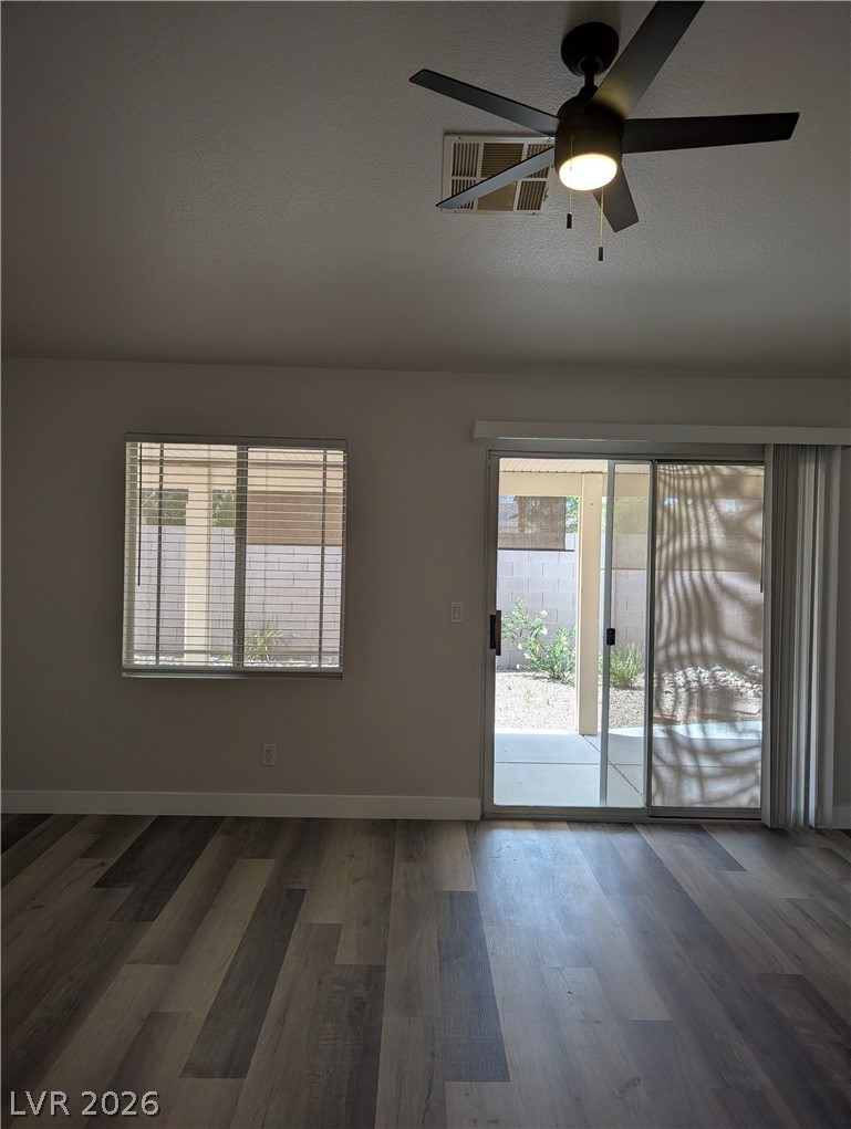 327 Perry Ellis Drive Henderson, NV 89014 - Photo 42 of 54 This bright space features sleek flooring and convenient access to outdoor living.