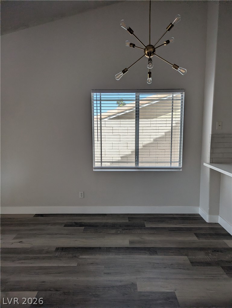 327 Perry Ellis Drive Henderson, NV 89014 - Photo 45 of 54 This versatile space features durable flooring and ample natural light, ideal for various living arrangements.