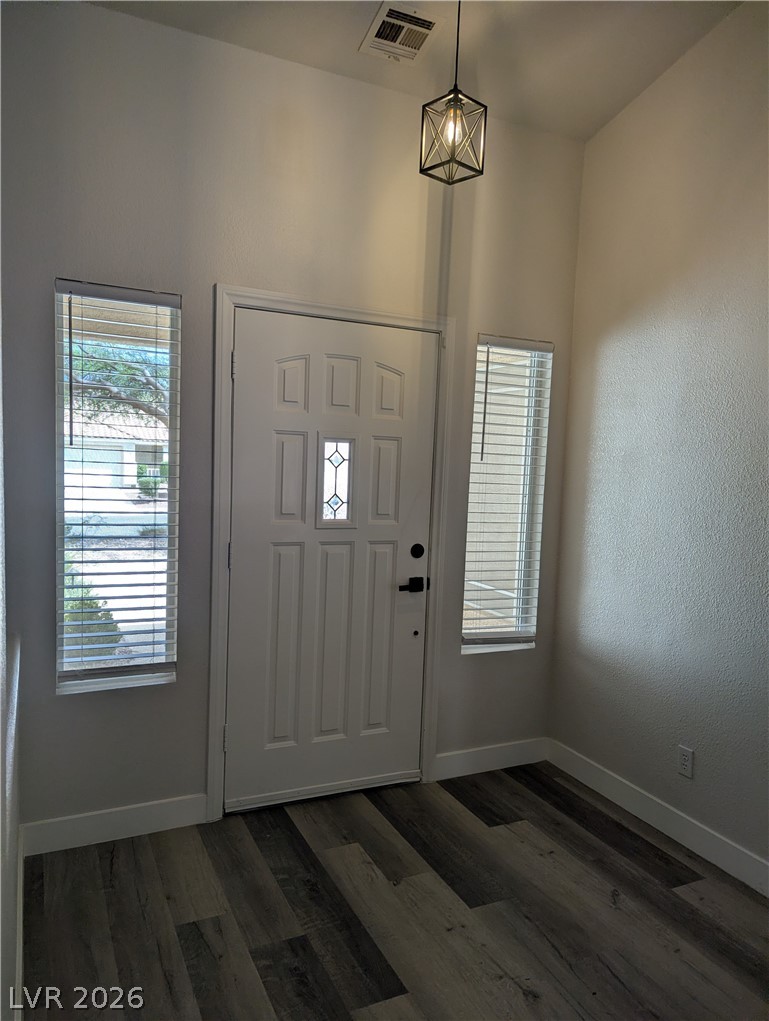 327 Perry Ellis Drive Henderson, NV 89014 - Photo 51 of 54 Enter into a welcoming space featuring durable flooring and natural light.