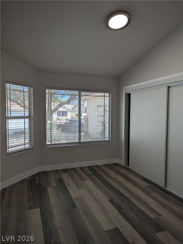 327 Perry Ellis Drive Henderson, NV 89014 - Photo 52 of 54 This bright room features durable flooring and ample natural light, perfect for versatile living.