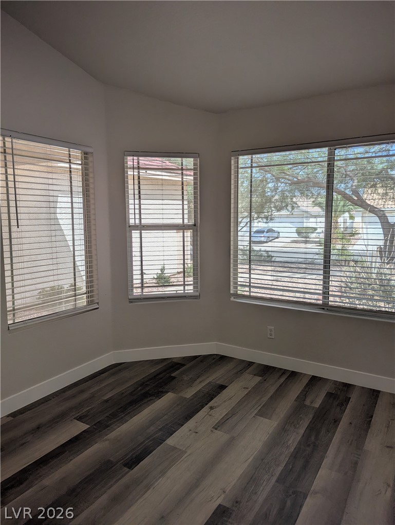 327 Perry Ellis Drive Henderson, NV 89014 - Photo 53 of 54 This bright space features rich flooring, creating a comfortable atmosphere.
