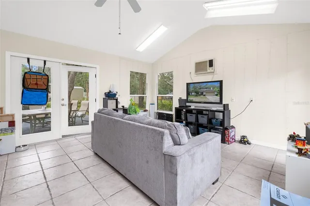 a view of an house with backyard space and garden