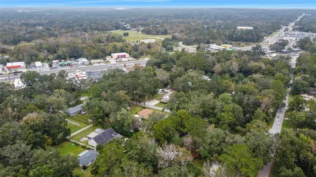 a view of a livingroom with furniture and wooden floor