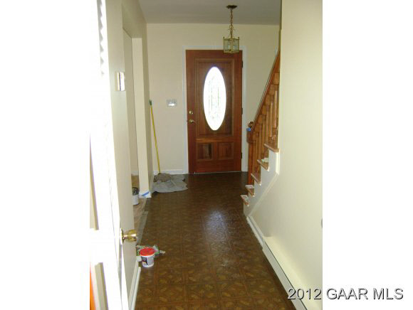 3817 Shutterlee Mill Road Staunton, VA 24401 - Photo 5 of 22 a view of a hallway with wooden floor