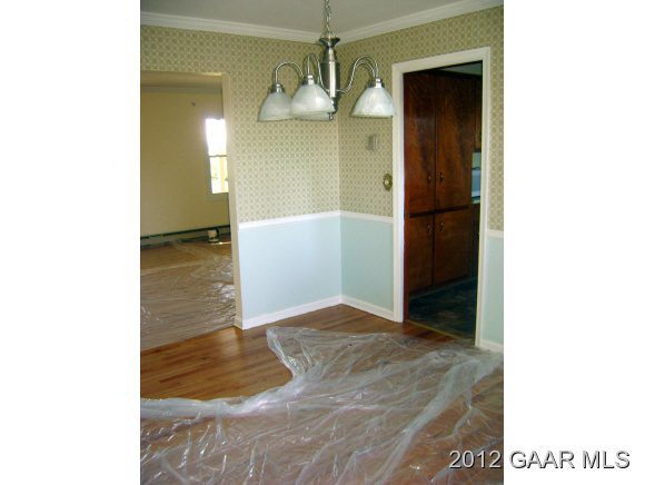 3817 Shutterlee Mill Road Staunton, VA 24401 - Photo 7 of 22 a view of a hallway with wooden floor