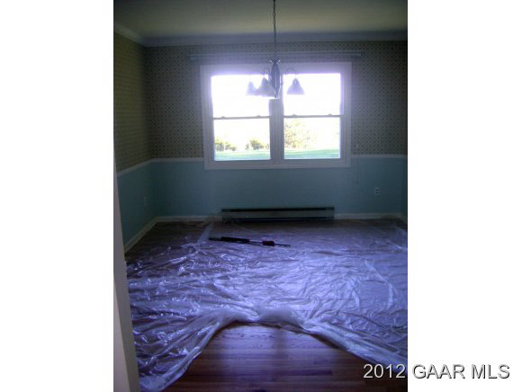 3817 Shutterlee Mill Road Staunton, VA 24401 - Photo 8 of 22 a room with a window and a rug