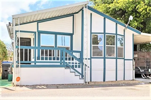 a bathroom with a toilet and a bathtub