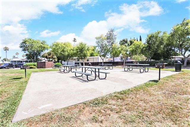 708 Spindrift Drive, Unit 708 San Jose, CA 95134 - Photo 17 of 18 a view of a park with swings and slides