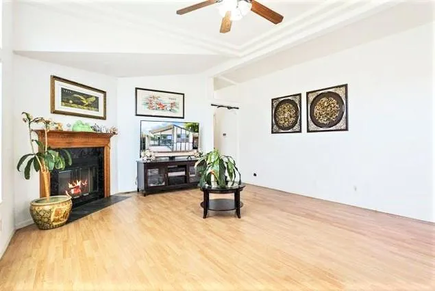 a bedroom with furniture and a fireplace