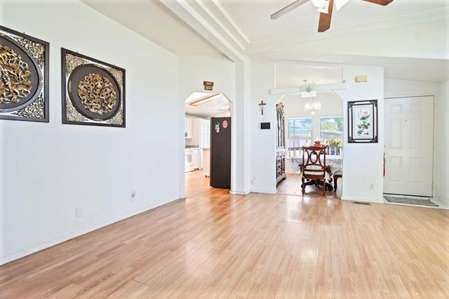 708 Spindrift Drive, Unit 708 San Jose, CA 95134 - Photo 6 of 18 a view of a room with wooden floor and furniture