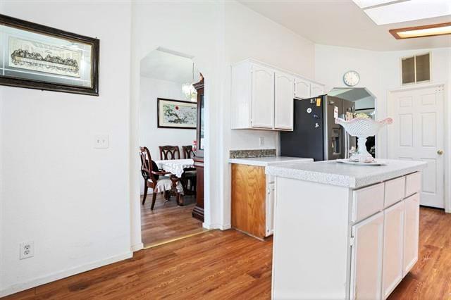 708 Spindrift Drive, Unit 708 San Jose, CA 95134 - Photo 10 of 18 a kitchen with a refrigerator and a stove