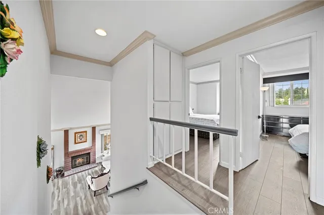 a view of a livingroom with furniture and hardwood floor