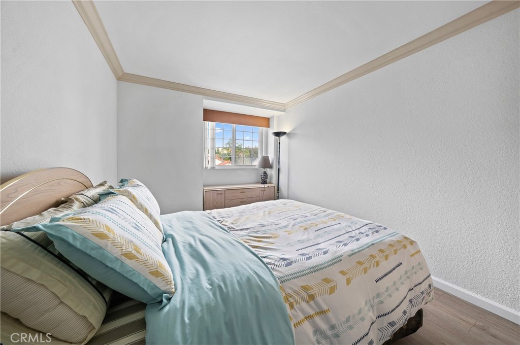 19528 Spinning Wheel Road Walnut, CA 91789 - Photo 24 of 40 a bedroom with a bed and a window