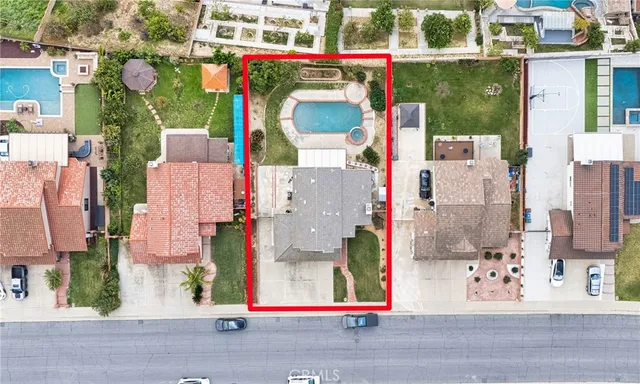 an aerial view of city and lake