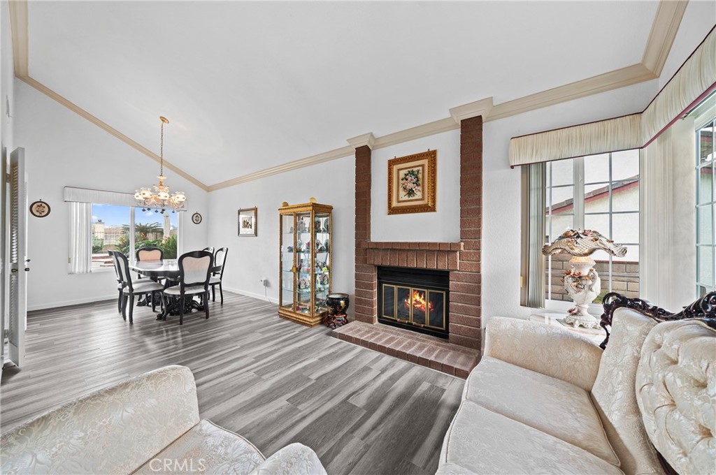 19528 Spinning Wheel Road Walnut, CA 91789 - Photo 8 of 40 a living room with furniture and a fireplace