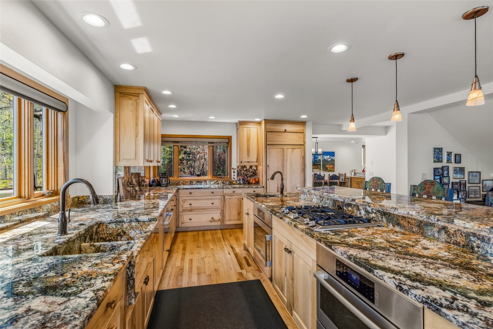 31775 Bradley Ranch Steamboat Springs, CO 80487 - Photo 40 of 49 a large kitchen with stainless steel appliances granite countertop a stove and a sink