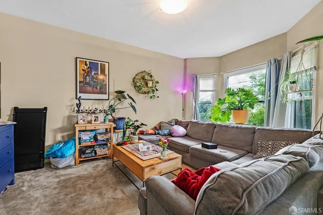 a bedroom with bed and a window