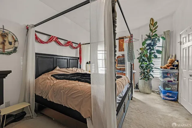 a view of a hallway to a livingroom and a hallway