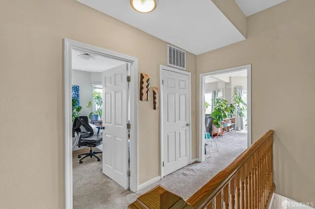 a kitchen with stainless steel appliances granite countertop a refrigerator stove and sink