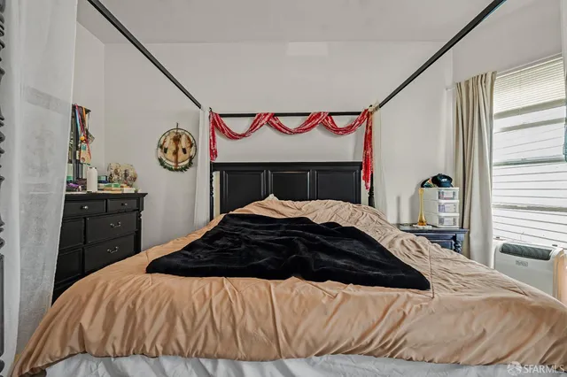 a kitchen with stainless steel appliances granite countertop a refrigerator a sink dishwasher a oven with white cabinets and wooden floor