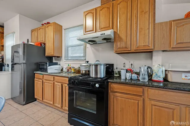 a bedroom with bed and a closet