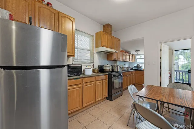 a bedroom with a bed and a lamp