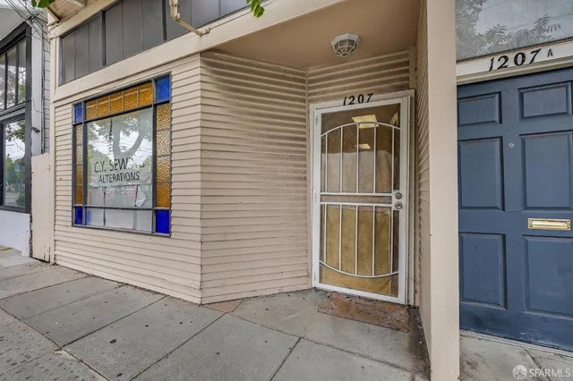 a kitchen with a cabinets and window