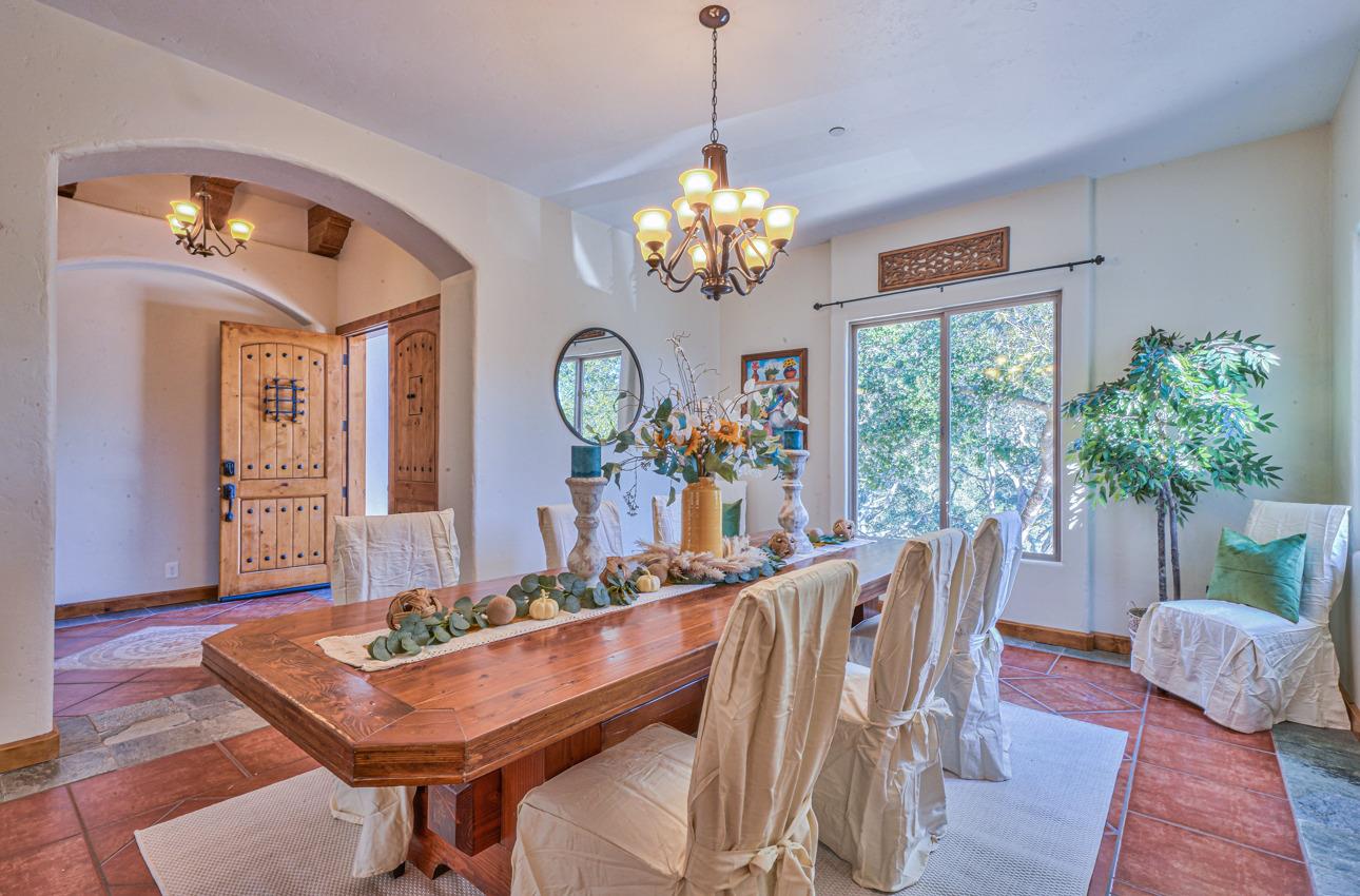 7382 Timeview Way Salinas, CA 93907 - Photo 14 of 79 a view of a dining room with furniture a chandelier and wooden floor