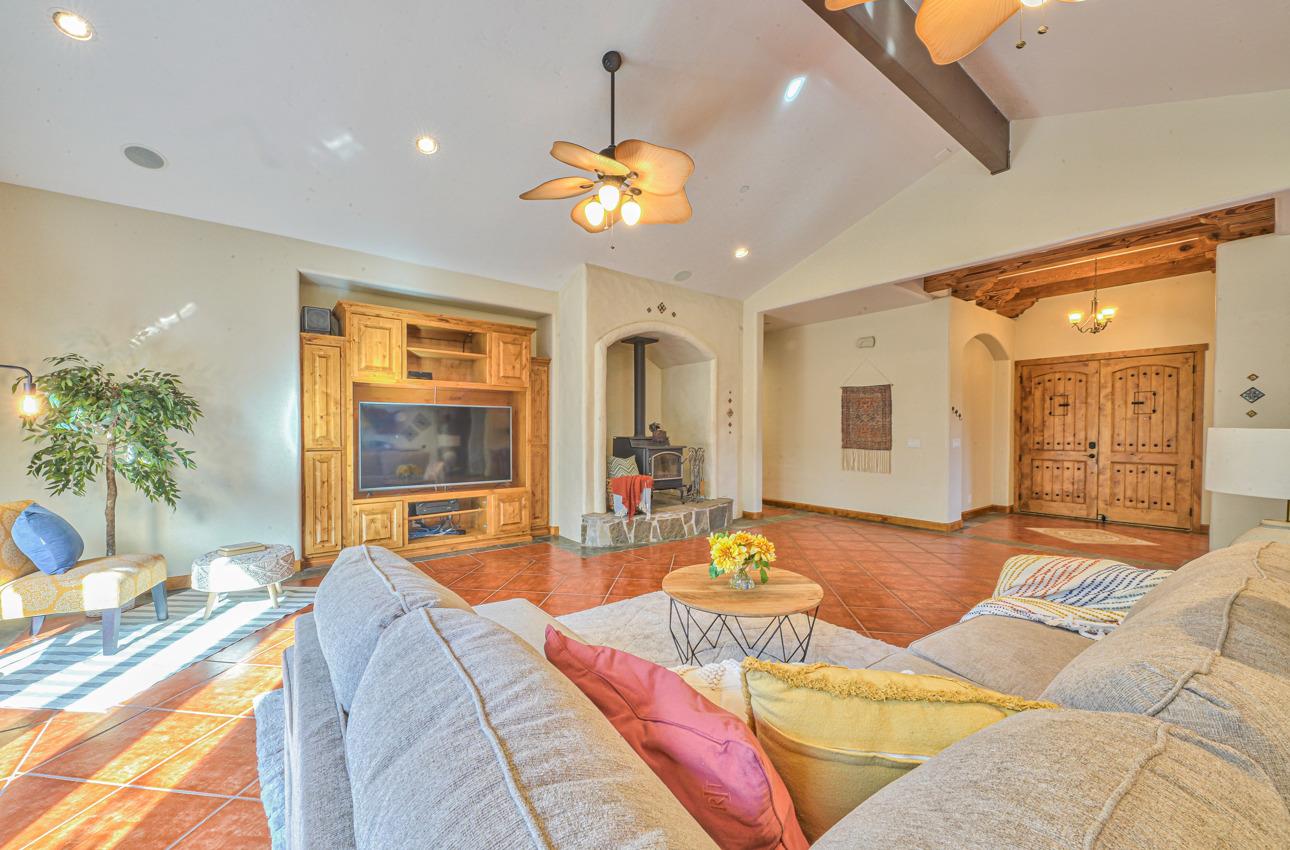 7382 Timeview Way Salinas, CA 93907 - Photo 15 of 79 a living room with furniture a chandelier and a dining table