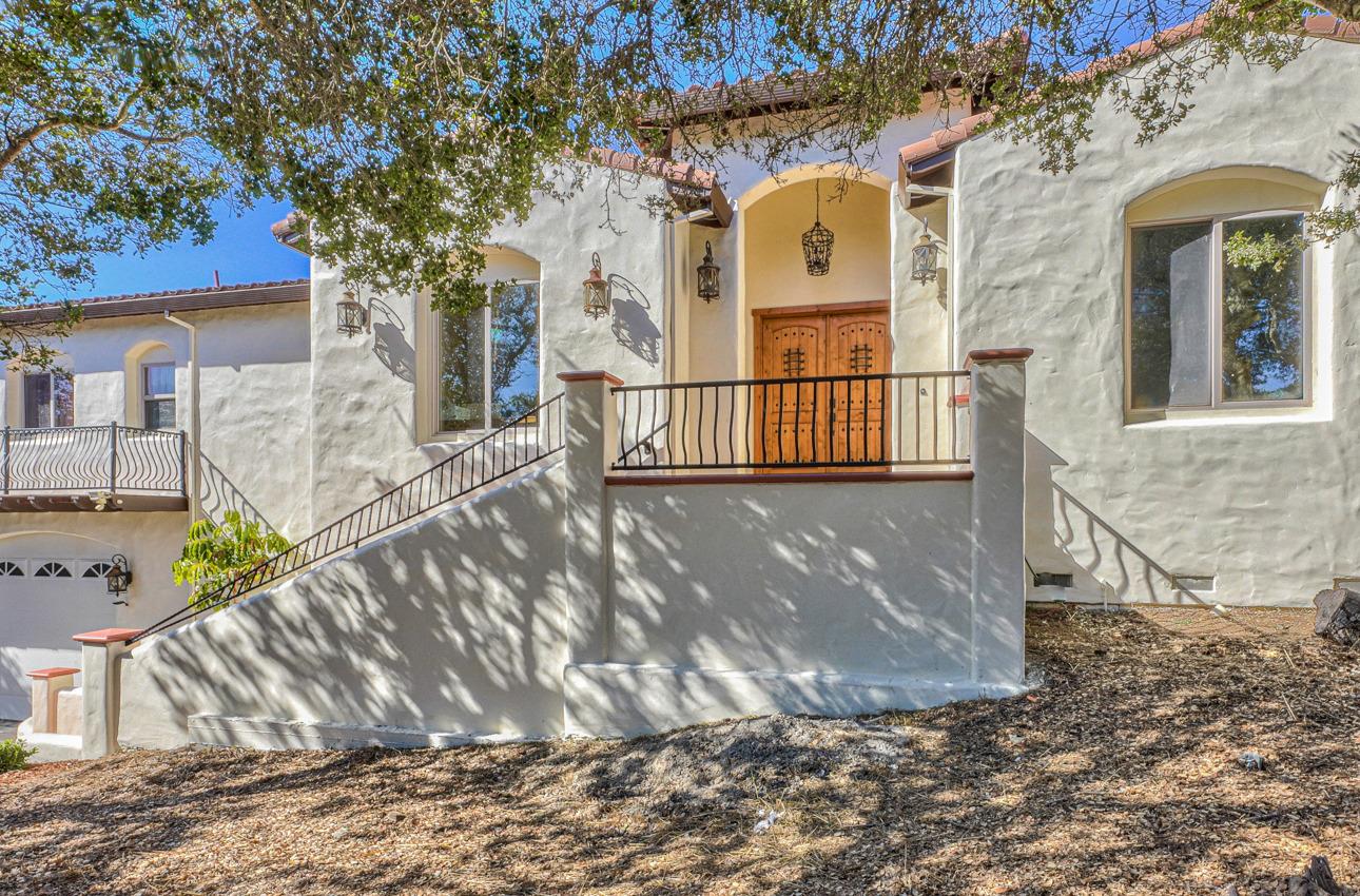 7382 Timeview Way Salinas, CA 93907 - Photo 2 of 79 a view of a brick house with large windows