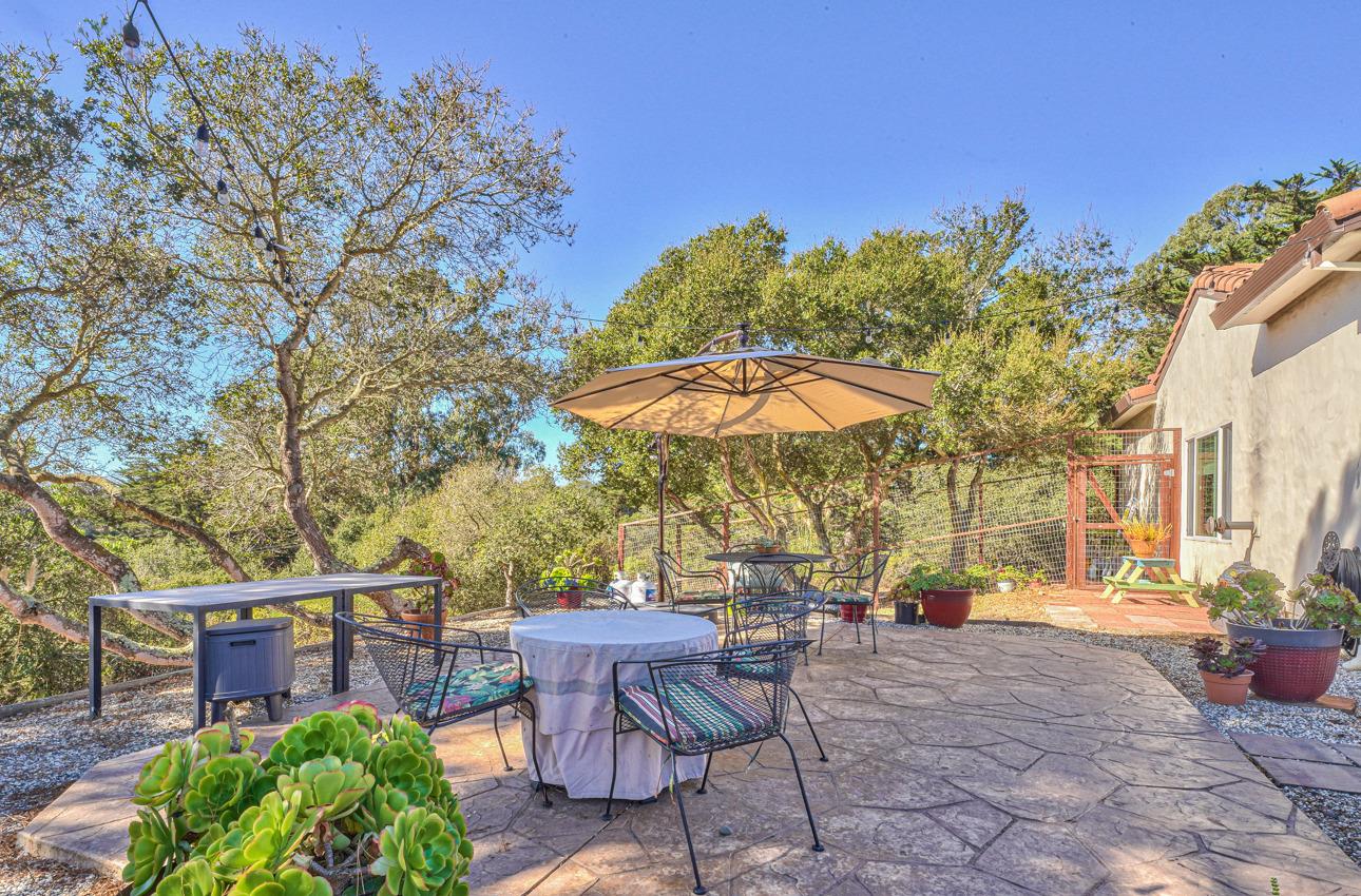7382 Timeview Way Salinas, CA 93907 - Photo 30 of 79 a view of a chairs and table in backyard