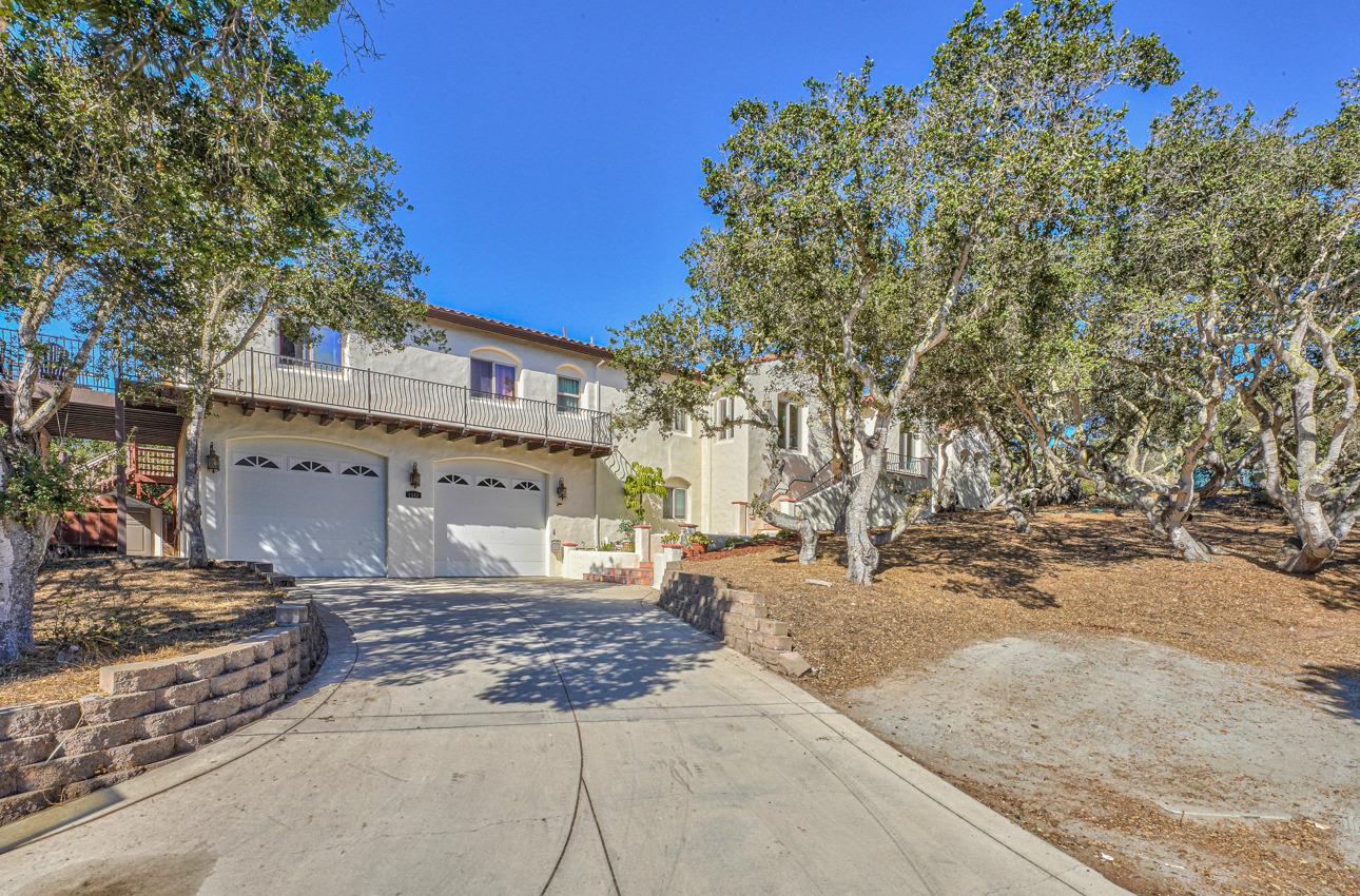 7382 Timeview Way Salinas, CA 93907 - Photo 3 of 79 a front view of a house with a yard