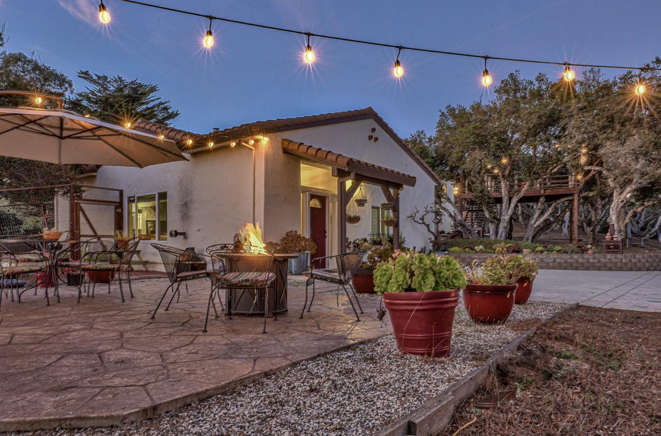 7382 Timeview Way Salinas, CA 93907 - Photo 41 of 79 a view of a patio with table and chairs potted plants