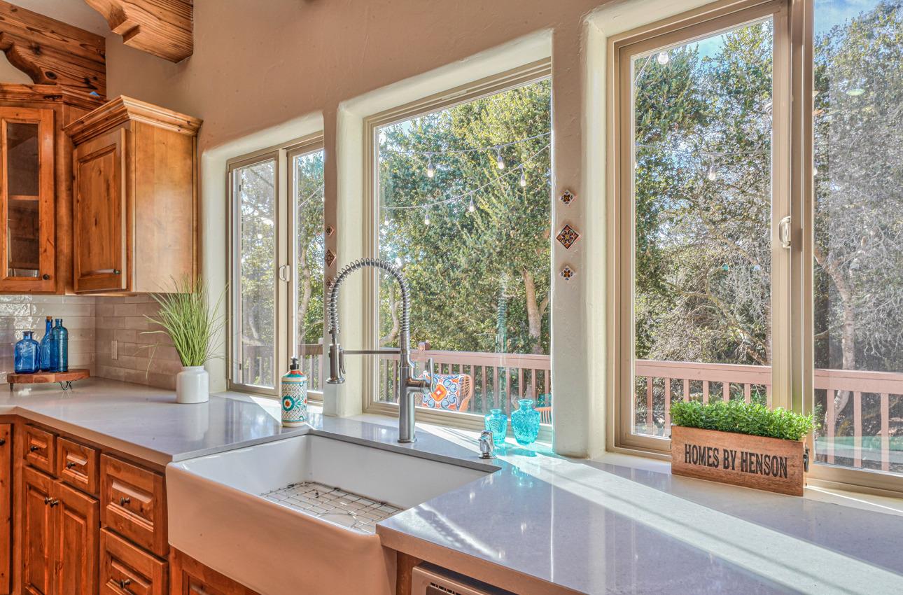 7382 Timeview Way Salinas, CA 93907 - Photo 57 of 79 a kitchen with kitchen island a large window in it